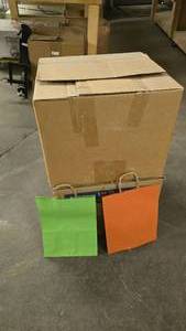 lot 933 image: 2 Boxes of Green & Orange Paper Gift Bags