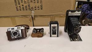 lot 946 image: Lot of 4 Vintage Cameras.  Includes Zeiss Icon Contina, Vintage Japan Small Binoculars, Kodak Duaklex II & Kodak 1A