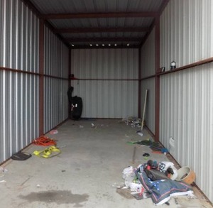 lot 329 image: STORAGE UNIT - (BB) 12 X 38  EXTENSION CORDS,  STRAPS,  CANS, FLAG, RIDING MOWER GRASS CATCHER   PLUS