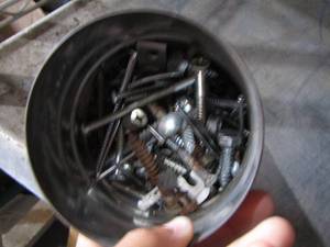 lot 77 image: tin can full of screws