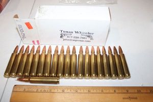 lot 147 image: Ammo Texas Wheeler 338 Rem Ultra mag (one white tip fell off)