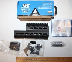 lot 204 image: AK47 universal drop in rail system