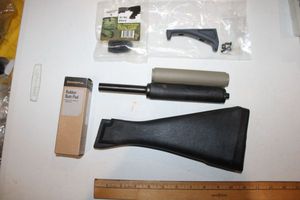 lot 195 image: Black stock, rubber pads and plugs, and more