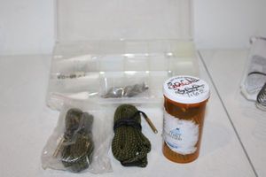 lot 261 image: Gun cleaners and 50 Cal Bore mop