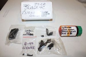 lot 285 image: Savage parts and Weaver scope screws - plus looks like mini magazine