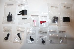 lot 303 image: HB Industries parts as shown