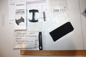 lot 304 image: Magpul Maglink Coupler, Cheek pad, and adjustable gas block wrench