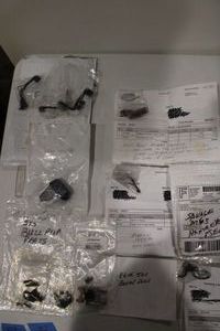 lot 310 image: Misc. parts Colt trigger, Savage hammer and sears, Marlin springs, barrel pins And more