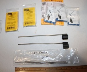 lot 311 image: Gas tubes, 450 Bushmaster mag followers, Ed Brown Bobtail parts
