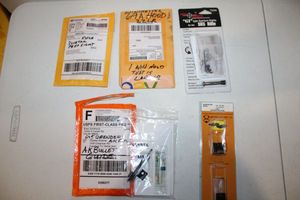 lot 314 image: Misc. parts Ironsighter bases, GI aperture sights, and more