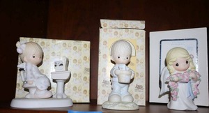 lot 15 image: Precious Moments figurines Forever in my Heart, To a special mum, Love is sharing