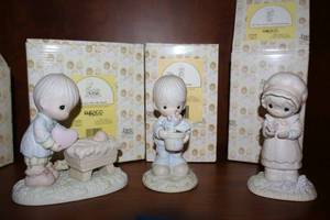 lot 20 image: Precious Moments figurines Ill give him my heart, To a special mum, We are Gods workmanship