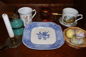 lot 22 image: Misc. Home Decor Precious Moments mug, ceramic Easter eggs, HandPainted Wood tea cup, mustache cup and more