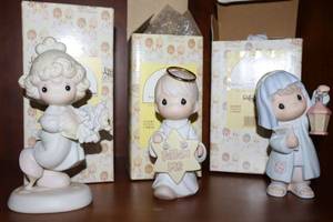 lot 24 image: Precious Moments figurines Lord, help me stick to my job, And you shall see a star, The light of the world is Jesus