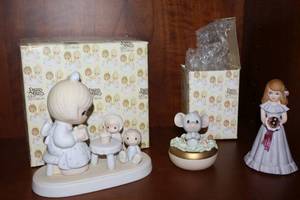 lot 28 image: Precious Moments figurines May your birthday be a blessing, Lettuce pray, and Growing up girl figurine