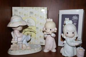 lot 39 image: Precious Moments figurines Just a line to say youre special, Lord give me a song, It is no secret what God can do