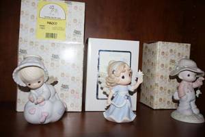 lot 40 image: Precious Moments figurines Sending my love your way, Hope shall light the world, and My love will never let you go