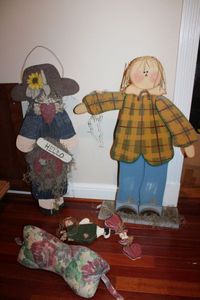 lot 46 image: Wooden decor standing figure, wall hangings as shown