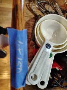 lot 150 image: Two hand mixers, measuring cups and more