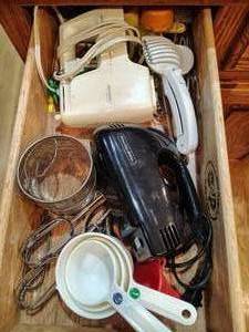 lot 150 image: Two hand mixers, measuring cups and more