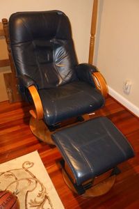 lot 120 image: Blue glider with foot ottoman glider