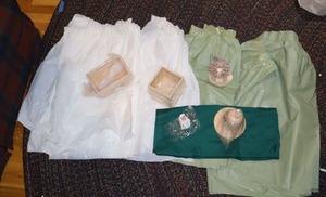 lot 182 image: Ceramic home decor and plastic table skirts