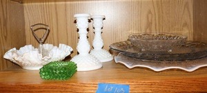 lot 103 image: White hobnail glass taper holders and nut tray, green nobnail votive holder, and clear plates