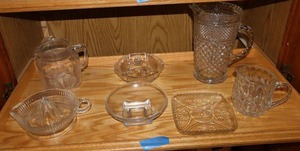 lot 132 image: Clear glass serving dishes and vintage juicer