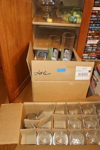 lot 89 image: Floating candles and clear glass candle holders