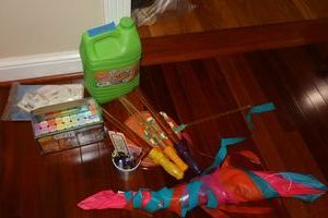 lot 219 image: Kids lot bubbles, kite, and sidewalk chalk