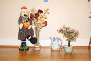 lot 307 image: Home decor pilgram doll, glass vase and watering pitcher, stone cut flowering tree