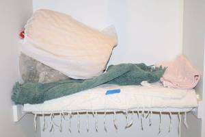 lot 303 image: Bath rugs, baby blanket and foam pad