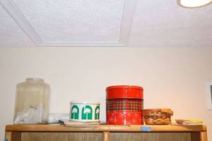 lot 278 image: Tins with buttons, small basket and large glass jar