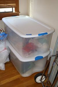 lot 270 image: Two totes with fabrics