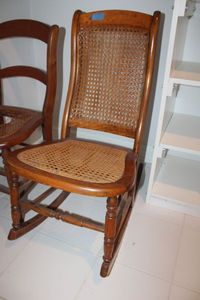 lot 284 image: Cane rocking chair and one that needs repair as shown