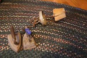 lot 224 image: Antique butter churn paddle and sad irons