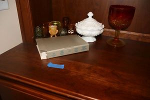 lot 43 image: Fenton White glass hobnail compote, carnival glass goblet, Colored glass votive candle holders (one is Vaseline glass)