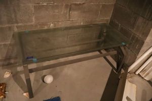 lot 353 image: Glass top table with metal frame