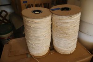 lot 383 image: 2 Spools of wick (can also be used as twine)