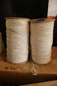 lot 384 image: 2 Spools of wick (can also be used as twine)
