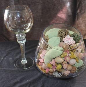 lot 48 image: Decorative Items Features a Glass Bowl Filled With Scented Potpourri and Botanicals, often Used for Home Fragrance and Accent