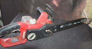 lot 51 image: Home lite 14in. 9 Amp Electric Chainsaw Designed for Cutting Firewood, Clearing Brush, and Trimming Trees