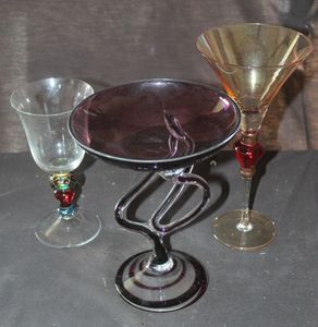 lot 52 image: Vintage Amethyst Art Glass&nbsp Jellyfish Pedestal bowl, Specifically a Polish Hand blown Piece from Jose fine Krosno. A Pier 1 Amber Luster 10 Martini Cocktail Glass.and Pier 1 P1C19 Pattern Wine Glass Featuring a Multicolored Stem with Gold Accent