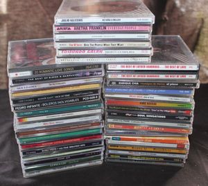 lot 63 image: a Collection of Various Music CDs from the 1990s and 2000s Including Artists Like Aretha Franklin and Pedro Infante
