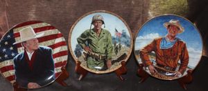 lot 65 image: Three Vintage Franklin Mint Porcelain Collector Plates Featuring Various Iconic Portraits of Actor John Wayne