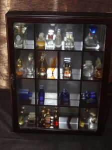 lot 73 image: Vintage Wooden Curio Cabinet Filled with a Collection of Miniature Perfume Bottles