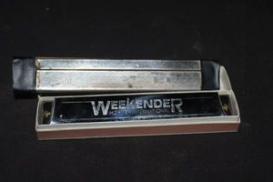 lot 76 image: Vintage Harmonica weekender international tremolo harmonica, likely produced in Germany, and echo Harmonica