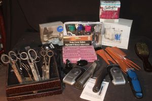 lot 82 image: Assortment of Vintage Hairdressing Tools, Including Shears, Clippers, Combs, and Rollers