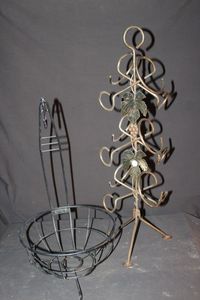 lot 83 image: Vintage Wine Rack featuring a Standing Tree Design with Decorative Grape Leaf accents, Similar to Sculptural Artisan Pieces. Fruit Bowl with Banana Hook.