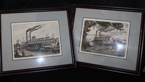 lot 101 image: Framed Sketch Amy Hewes Down the River A historic Sternwheeler, a Shallow-water Boat. Framed Print of Natchez a Mississippi river steamboat. These are Artists Proofs, both are signed.